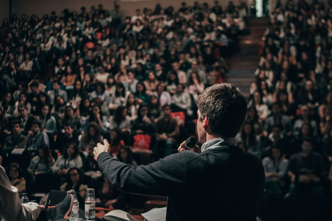 person speaking confidently in meeting